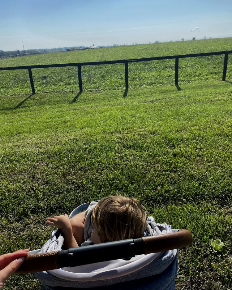 Sophia reading a story to a small group